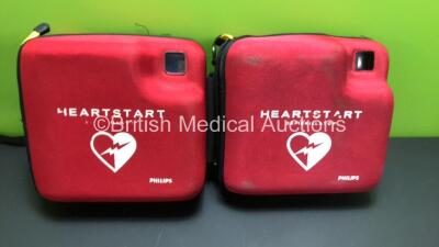 1 x Laerdal HeartStart FR2+ Defibrillator (Powers Up with Stock Battery - Not Included) and 1 x Laerdal HeartStart FR2 Defibrillator (No Power) with 2 x Carry Cases - 5