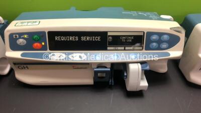 Job Lot Including 2 x Alaris PK Syringe Pumps (1 x Carefusion, 1 x Cardinal Health) and 2 x Alaris GH Syringe Pumps (1 x Carefusion, 1 x Cardinal Health) All Draw Power with 2 x Service Required and 2 x Alarms *18166 - 24530 - 800247840 - 800504938* - 4