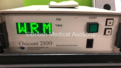 Mixed Lot Including 1 x Waters Instruments Oxicom 2100 Whole Blood Oximeter (Powers Up) 1 x Biosense Webster CoolFlow Irrigation Pump (Powers Up) 1 x Carefusion Micro I Spirometer in Case and 1 x Medela Calesca Warming-Thawing Device - 2