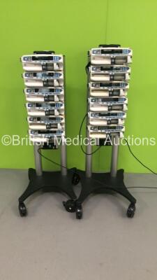 2 x Alaris Asena Docking Stations with 8 x Carefusion Alaris CC Syringe Pumps and 4 x Cardinal Health Alaris CC Syringe Pumps (All Power Up)