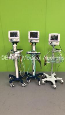 3 x Fukuda Denshi DS-7100 Patient Monitors on Stands with ECG/Resp,SpO2,NIBP,BP and Temp Options,3 x BP Hoses,3 x ECG Leads,3 x SpO2 Finger Sensors and 3 x BP Cuffs (All Power Up) * SN 50001955 / 50002403 / 50002596 *