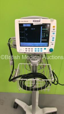 Datex-Ohmeda S/5 FM F-FM-00 Patient Monitor on Stand with 1 x E-PSMP-00 Module with NIBP,P1/P2,T1/T2,SpO2 and ECG Options,1 x BP Hose,1 x SpO2 Lead and 1 x 3-Lead ECG Lead (Powers Up) - 2