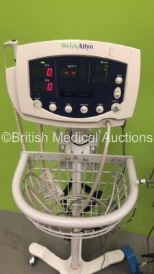 1 x GE Dinamap Pro 300 Patient Monitor on Stand with 1 x SpO2 Finger Sensor and 1 x BP Hose and Cuff and 1 x Welch Allyn 53NTO Patient Monitor on Stand with 1 x BP Hose and 1 x SpO2 Finger Sensor (Both Power Up) * SN JA091604 / 010M3399050 * - 3