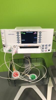 2 x Huntleigh Sonicaid FM800 Encore Fetal Monitors on Stands with 2 x Transducers (Both Power Up - 1 x Crack in Casing - See Pictures) - 2