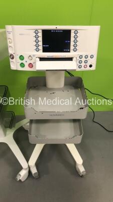 2 x Huntleigh Sonicaid FM800 Encore Fetal Monitors on Stands with 2 x Transducers (Both Power Up - 1 x Crack in Casing - See Pictures) - 6