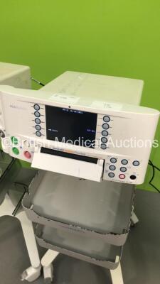 2 x Huntleigh Sonicaid FM800 Encore Fetal Monitors on Stands with 2 x Transducers (Both Power Up - 1 x Crack in Casing - See Pictures) - 8