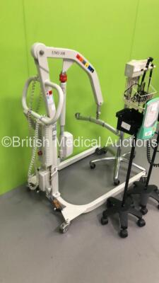 1 x Liko Uno Electric Patient Hoist with Battery and Controller, 2 x Accoson Greenlight 300 Blood Pressure Meters on Stands and 1 x Welch Allyn Otoscope / Ophthalmoscope Set on Stand with 2 x Handpieces and 1 x Head - 3