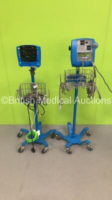 1 x GE Carescape Vital Signs Monitor on Stand and 1 x GE Dinamap Pro 300 Vital Signs Monitor on STand with SPO2 Finger Sensor and BP Hose (Both Power Up)