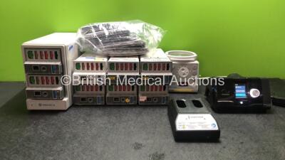 Mixed Lot Including 1 x GE TRAM RAC 4A Module Rack with 8 x GE TRAM 451N Modules, 4 x Philips Large Adult BP Cuffs, 1 x Verathon 0400-0130 Battery Charger (Untested Due to No Power Supply) 1 x Fisher & Paykel MR730 Respiratory Humidifier (Powers Up) 1 x R