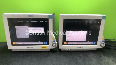 2 x Philips IntelliVue MP70 Neonatal Touch Screen Patient Monitors Software Revision M.04.00, M.04.00 (Both Power Up with Minor Damage-See Photos) *SN DE84394611, DE84B4861*