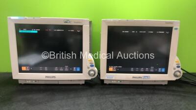 2 x Philips IntelliVue MP70 Neonatal Touch Screen Patient Monitors Software Revision M.04.00, H.15.41 (Both Power Up with Minor Damage and Missing Model Tags -See Photos) *SN DE44027427, DE54937630*