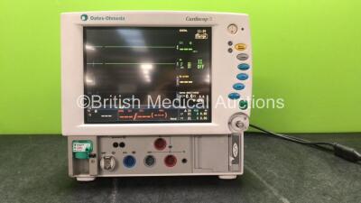 Datex Ohmeda Cardiocap / 5 Patient Monitor Including Spirometry, ECG, SpO2, NIBP, P1, P2, T1 and Printer Options with D-fend Water Trap (Powers Up with Damaged Dial-See Photo) *SN 3816417*