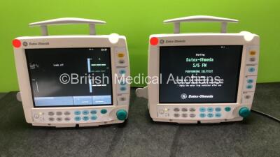 2 x Datex Ohmeda S/5 FM Type F-FM-00 Patient Monitors with 2 x GE E-PSMP-00 Modules Including ECG, Sp02, NIBP, T1, T2, P1 and P2 Options (Both Power Up) *SN 6399120, 6399175*