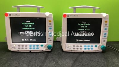 2 x Datex Ohmeda S/5 FM Type F-FM-00 Patient Monitors with 2 x GE E-PSMP-00 Modules Including ECG, Sp02, NIBP, T1, T2, P1 and P2 Options (Both Power Up) *SN 6399158, 6399125*