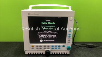 Datex Ohmeda Compact Anesthesia Monitor with 1 x GE Type E-PRESTN Module Including ECG, NIBP, SpO2, T1, T2, P1 and P2 Options, 2 x Blank Modules (Powers Up) *SN 6595476*