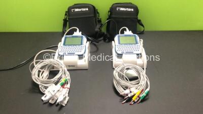 2 x Mortara ELI 10 Handheld ECG Machines with 10 Lead ECG Leads and Docking Stations in Cases (Both Power Up)