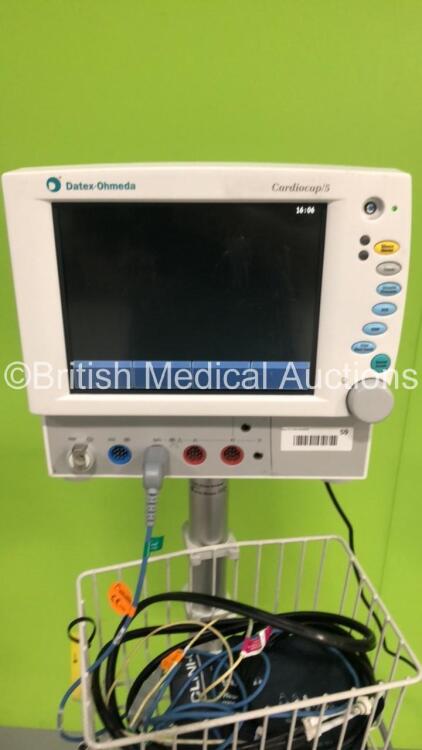 Datex-Ohmeda Cardiocap/5 Patient Monitor with NIBP,ECG,SpO2,P1,P2,T1 and T2 Options,1 x SpO2 Finger Sensor,1 x BP Hose and 1 x BP Cuff on Stand (Powers Up) * SN 5156420 * * Mfd 2004 *