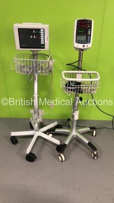 1 x Mindray VS-800 Vital Signs Monitor on Stand (Missing Top Light Cover - See Pictures) and 1 x Spacelabs 90369 Monitor on Stand with ECG, hlo1, hlo2, BP, NIBP, SPO2 and T1-2 Options (Both Power Up) *S/N 369-114138 / BY-83104743*