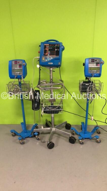 1 x GE Pro 1000 Patient Monitor on Stand,1 x Dinamap Pro 300V2 Vital Signs Monitor on Stand and 1 x Dinamap Pro 300 Vital Signs Monitor on Stand (All Power Up - 1 x with Error - See Pictures) *S/N 20134 /