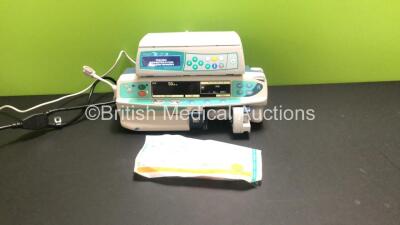 Job Lot Including 1 x Cardinal Health Alaris PK Syringe Pump and 1 x B.Braun Infusomat SpaceP Infusion Pump *Version - 687L* with Luer Lock *Expired - 2014* and Power Supply (Both Power Up)