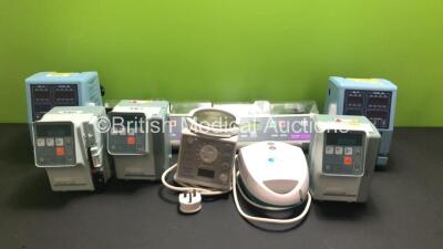 Mixed Lot Including 21 x IVAC Model 598 Volumetric Pumps (Majority Damaged / Missing Casing), 2 x Volumed uVP 5000 Infusion Pumps, 2 x Graseby 3300 PCA Pumps, 1 x Fisher and Paykel MR730 Respiratory Humidifier and 1 x AirMed 1000 Tabletop Compressor Nebul