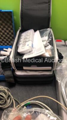 Large Mixed Lot Including 2 x Arjo Electric Patient Hoist Batteries,Assorted Patient Monitor Leads,Rigel Medical 288 Tester,Philips Module Housing,2 x Biotronik Reocor D Units in Carry Cases,3 x Vidacare EZ-I/EZ-10 Power Drivers and B.Braun Syringe Gauge - 10