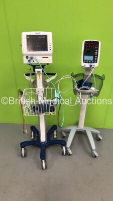 1 x Fukuda Denshi DS-7100 Patient Monitor on Stand with SPO2 Finger Sensor, BP Hose and ECG Leads and 1 x Mindfray VS-800 Vital Signs Monitor on Stand with BP Hose and ECG Leads (Both Power Up)