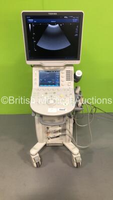 Toshiba Xario 200 Flat Screen Ultrasound Scanner Model TUS-X200 *S/N 99B1483473* **Mfd 08/2014** Software Version 2.0 with 2 x Transducers / Probes (PLU-1005BT *Mfd 06/2014* and PVU-375BT *Mfd 07/2014*) (Powers Up - Missing Dial Caps - See Pictures) ***I