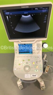 Toshiba Xario 200 Flat Screen Ultrasound Scanner Model TUS-X200 *S/N 99B1483473* **Mfd 08/2014** Software Version 2.0 with 2 x Transducers / Probes (PLU-1005BT *Mfd 06/2014* and PVU-375BT *Mfd 07/2014*) (Powers Up - Missing Dial Caps - See Pictures) ***I - 3