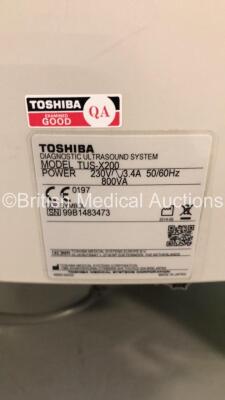 Toshiba Xario 200 Flat Screen Ultrasound Scanner Model TUS-X200 *S/N 99B1483473* **Mfd 08/2014** Software Version 2.0 with 2 x Transducers / Probes (PLU-1005BT *Mfd 06/2014* and PVU-375BT *Mfd 07/2014*) (Powers Up - Missing Dial Caps - See Pictures) ***I - 17