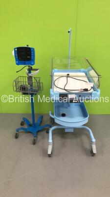 GE Carescape Dinamap V100 Vital Signs Monitor on Stand (Powers Up) and 1 x Kanmed Baby Bed