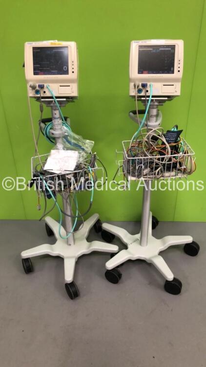 2 x Fukuda Denshi DS-7100 Patient Monitors on Stands with Leads (Both Power Up)