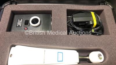 Mixed Lot Including 1 x Carefusion Alaris PK Syringe Pump (Powers up with Service Required) 2 x Exergen Temporal Scanner Thermometers in Cases with Accessories and 1 x Smith&Nephew Footswitch (Damage to Cable - See Photo) - 4