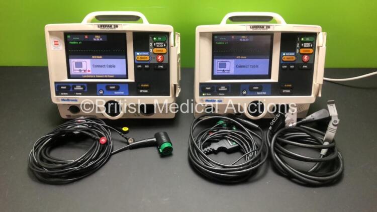 2 x Lifepak 20 Defibrillator / Monitors *Mfd 2004 - 2005* Including ECG and Printer Options with 2 x Paddle Leads and 2 x ECG Leads (Both Power Up) *GL*