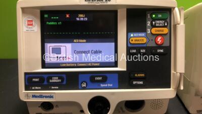 2 x Lifepak 20 Defibrillator / Monitors *Mfd 2004 - 2005* Including ECG and Printer Options with 2 x Paddle Leads and 2 x ECG Leads (Both Power Up) *GL* - 3