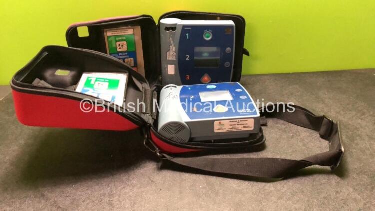 2 x Philips Heartstart FR2+Defibrillators in Carry Cases (Both Power Up when Tested with Stock Batteries-Batteries Not Included) *SN 0207223350, 0207223346*