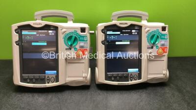 1 x Philips Heartstart MRx Defibrillator Including ECG and Printer Options, 1 x Philips Heartstart MRx Defibrillator Including Pacer, ECG and Printer Options with 2 x Philips M3539A Power Adapter and 2 x Philips M3538A Batteries (Both Power Up with Device