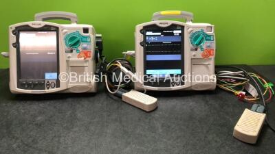 2 x Philips MRx Defibrillators Including Pacer, ECG and Printer Options with 2 x Philips M3539A Power Adapters and 2 x Philips M3538A Batteries 2 x Paddle Lead, 2 x Philips M3725A Test Loads and 2 x 3 Lead ECG Leads (Both Power Up)