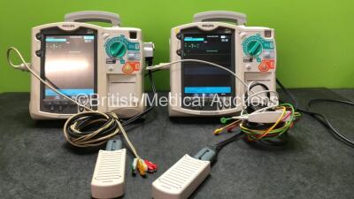 2 x Philips MRx Defibrillators Including Pacer, ECG and Printer Options with 2 x Philips M3539A Power Adapters and 2 x Philips M3538A Batteries 2 x Paddle Lead, 2 x Philips M3725A Test Loads and 2 x 3 Lead ECG Leads (Both Power Up)