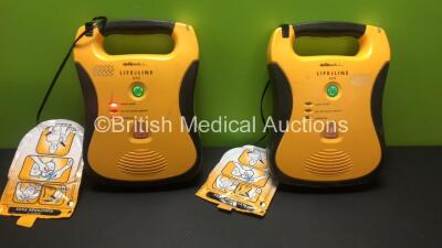 2 x Defibtech Lifeline AED Defibrillators with Batteries and Electrode Packs (Both Power Up) *GI*