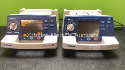 1 x Agilent Heartstream XL Defibrillator Including ECG and Printer Options (Powers Up) 1 x Philips Heartstart XL Defibrillator Including ECG and Printer Options (No Power)