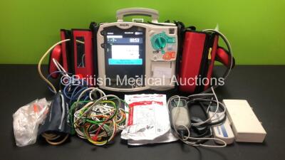 Philips Heartstart MRx Defibrillator Including ECG, CO2, NIBP, SpO2 and Printer Options *Mfd 2010* with Side Bags Containing 3 x M3538A Batteries, 1 x ECG Lead, 1 x SpO2 Lead, 1 x BP Lead with Cuff, 1 x Paddle Lead with Test Load, 1 x Laerdal Q-CPR Meter 