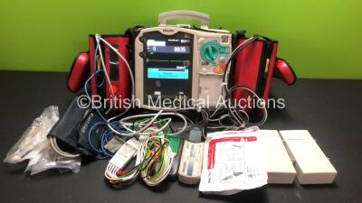 Philips Heartstart MRx Defibrillator Including ECG, CO2, NIBP, SpO2 and Printer Options *Mfd 2010* with Side Bags Containing 3 x M3538A Batteries, 1 x ECG Lead, 1 x SpO2 Lead, 1 x BP Lead with Cuff, 1 x Paddle Lead with Test Load, 1 x Laerdal Q-CPR Meter 