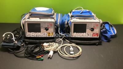 2 x Zoll E Series Defibrillators Including ECG, SpO2, CO2, NIBP and Printer Options with 1 x Battery (Flat) 1 x 4 Lead and1 x 6 Lead ECG Leads, 1 x SpO2 Lead with Finger Sensor and 1 x BP Lead with Cuff (Untested Due to Flat Battery)