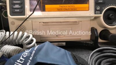 Medtronic Lifepak 12 Biphasic Defibrillator Including ECG, SpO2, NIBP, CO2 and Printer Options with 2 x Lifepak NiCd Batteries, 1 x NIBP Hose, 1 x BP Cuff, 1 x SpO2 Finger Sensor and 1 x Paddle Lead (Powers Up) *SN 37620264* - 4