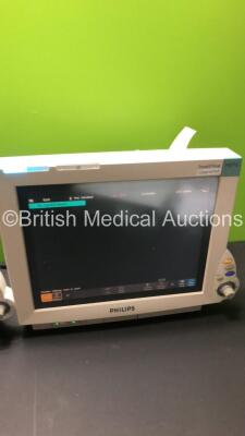 2 x Philips IntelliVue MP70 Patient Monitors (Both Power Up-1 x Damage to Casing-See Photos) * Mfd 2009 / 2005 * - 3