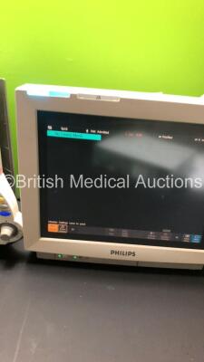 2 x Philips IntelliVue MP70 Patient Monitors (Both Power Up-1 x Damage to Casing-See Photos) * Mfd 2009 / 2005 * - 6