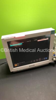 2 x Philips IntelliVue MP70 Patient Monitors (Both Power Up-1 x Damage to Casing-See Photos) * Mfd 2009 / 2005 * - 7