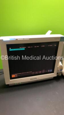 2 x Philips IntelliVue MP70 Patient Monitors (Both Power Up-1 x Damage to Casing and 1 x Broken Control Panel-See Photos) * Mfd 2005 / 2003 * - 2