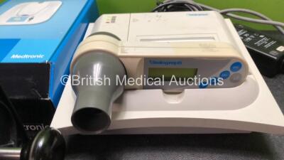 Mixed Lot Including 1 x Vitalograph Syringe Driver, 1 x Vitalograph 2130 Base Station with 1 x Vitalograph 2120 Spirometer and 1 x AC Power Supply (Base Station Powers Up, Spirometer No Power) 1 x My Care Link Unit and 1 x Nellcor N-560 Pulse Oximeter (Po - 3